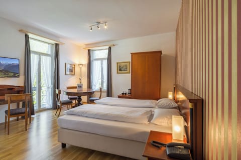 Superior Triple Room | Hypo-allergenic bedding, down comforters, in-room safe