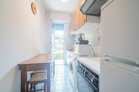 Comfort Apartment | Private kitchen | Full-size fridge, microwave, oven, stovetop