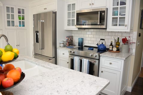 Luxury Condo | Private kitchen | Full-size fridge, microwave, oven, stovetop