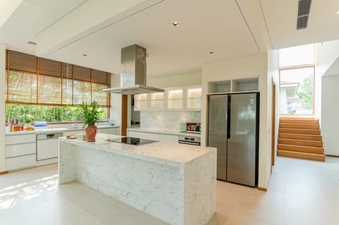 Luxury Villa | Private kitchen | Fridge, microwave, highchair