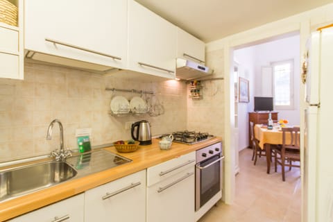 Standard Apartment, 1 Bedroom (Libeccio House) | Private kitchen | Fridge, microwave, oven, stovetop