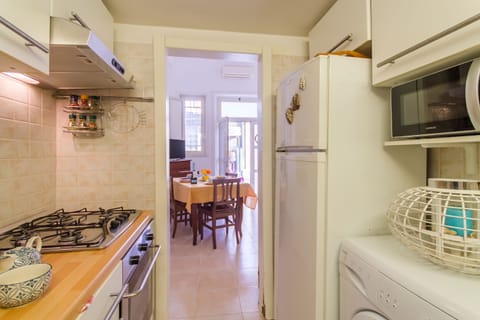 Standard Apartment, 1 Bedroom (Libeccio House) | Private kitchen | Fridge, microwave, oven, stovetop