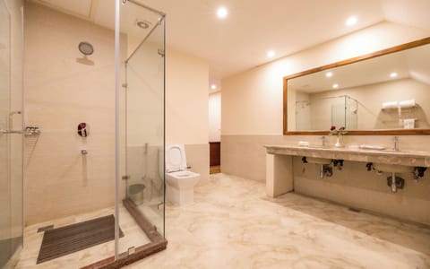 Xclusiv Room | Bathroom | Shower, free toiletries, towels, soap