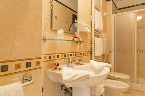 Free toiletries, hair dryer, bidet, towels