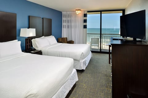 Room, 2 Queen Beds, Balcony, Oceanfront | Premium bedding, pillowtop beds, in-room safe, individually decorated