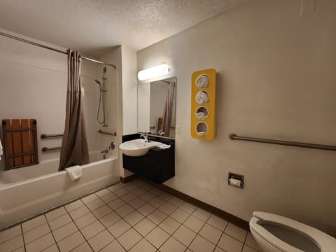 Combined shower/tub, hair dryer, towels, soap