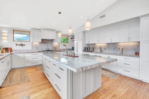 Fully stocked kitchen (upstairs) with access to the balcony