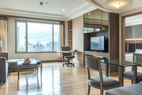 Deluxe Suite, 1 Bedroom | Living area | 42-inch LCD TV with cable channels