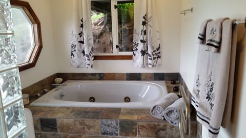 Luxury Studio Suite, 1 Bedroom, Jetted Tub, Garden View (Ohia Ranch Retreat) | Bathroom | Free toiletries, bathrobes, slippers, towels