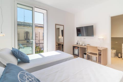 Classic Room, Balcony, City View | Premium bedding, down comforters, minibar, in-room safe