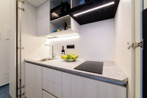 Exclusive Suite, Non Smoking, City View | Private kitchen | Full-size fridge, microwave, stovetop, toaster