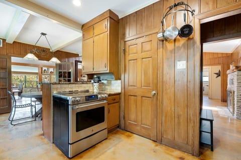 Kitchen area.  Pots on wall are just a few of the total we have.