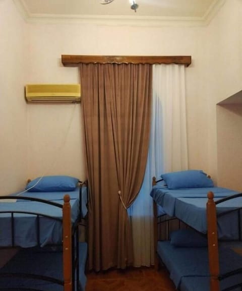 Basic Quadruple Room | Blackout drapes, soundproofing, iron/ironing board, free WiFi