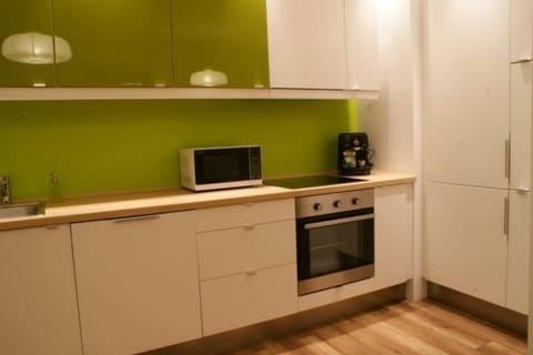 Apartment, 2 Bedrooms (Olive Suite) | Private kitchen | Full-size fridge, stovetop, dishwasher, coffee/tea maker