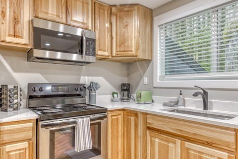 Gourmet kitchen awaits! Featuring top-tier appliances for all your culinary creations.