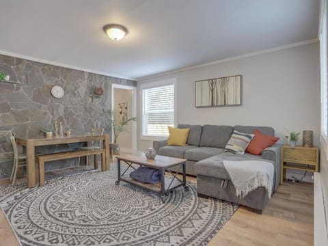 Stretch out and relax in our spacious living room! Plenty of comfy seating for everyone to unwind after a day of fun. Book your comfortable gathering space!