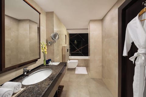 Presidential Suite | Bathroom | Shower, rainfall showerhead, hair dryer, towels