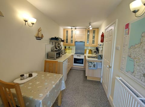 Dining area with table and two chairs