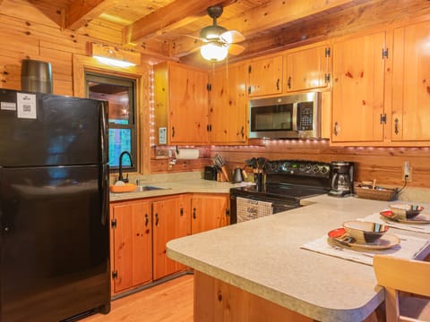 The fully equipped kitchen with an island.
