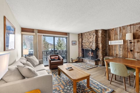 You will love this unit with new flooring, new sleeping sofa and wood fireplace!