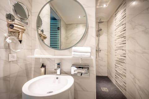 Shower, eco-friendly toiletries, hair dryer, towels