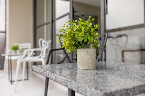 Enjoy peaceful moments on the balcony—perfect for morning coffee or evening drinks.