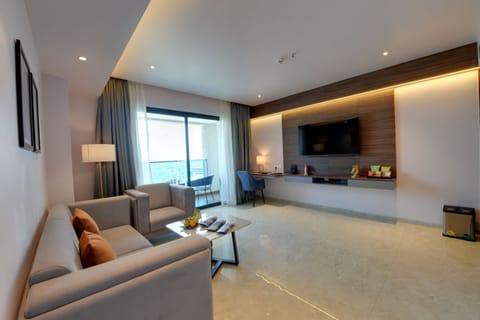 Fern Club Suite | Living area | 42-inch LED TV with satellite channels