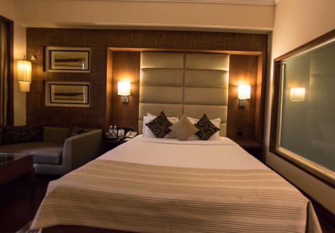 Premium bedding, Select Comfort beds, free minibar items, in-room safe