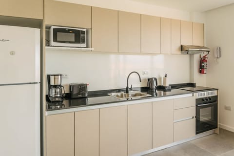 Apartment (Urbano 3) | Private kitchen | Fridge, microwave, stovetop, coffee/tea maker