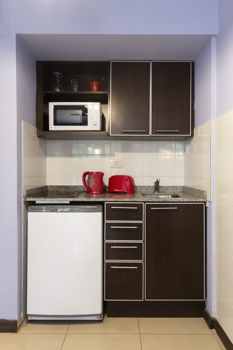 Fridge, microwave, stovetop, coffee/tea maker