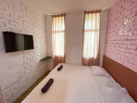 Deluxe Room, 1 King Bed | Iron/ironing board, free WiFi, bed sheets