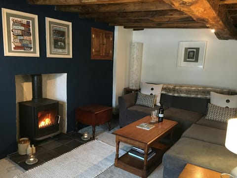 Wood burner, coffee table, corner sofa