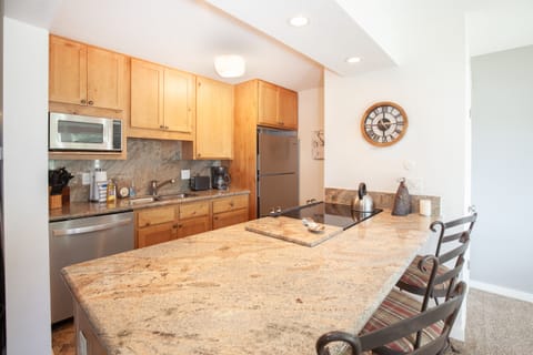 Granite counter tops, stainless steel appliances and all the gadgets you need