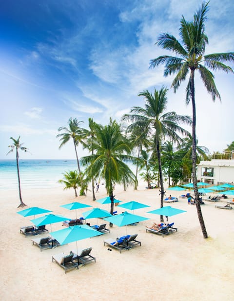 On the beach, white sand, beach towels