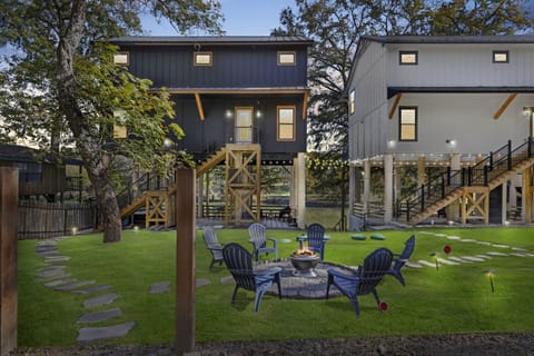 Two beautifully crafted, brand-new riverfront homes on the Guadalupe, with direct float access, serene tree-lined views, and three private balconies, perfect for enjoying nature, stunning views, and modern comfort.