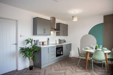 Revel in the convenience of a fully equipped kitchen with proper lightening, making you the real chef!