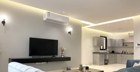 Design Apartment, 3 Bedrooms | Living area | Flat-screen TV