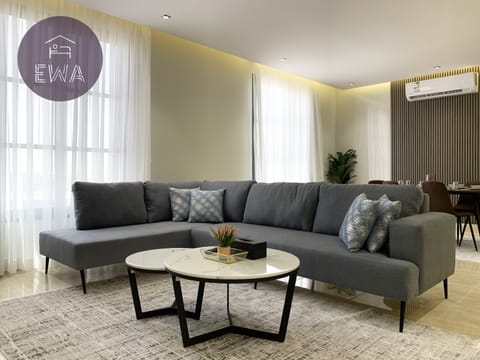 Design Apartment, 3 Bedrooms | Living area | Flat-screen TV