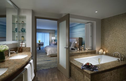 Junior Suite with Balcony | Bathroom | Combined shower/tub, free toiletries, hair dryer, bathrobes