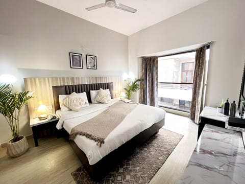 Premium Apartment, City View | Hypo-allergenic bedding, desk, blackout drapes, iron/ironing board