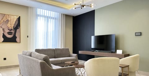 Design Apartment, 3 Bedrooms | Living area | Flat-screen TV