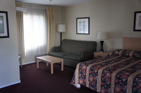 Room, 1 King Bed, Non Smoking, Kitchenette | Blackout drapes, iron/ironing board, free WiFi