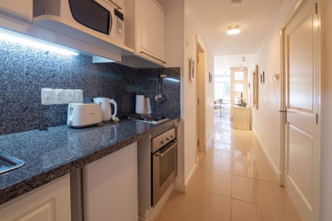 Economy Apartment, Garden View | Private kitchen | Microwave, oven, electric kettle, toaster