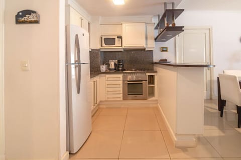 Family Apartment, Garden View | Private kitchen | Microwave, oven, electric kettle, toaster