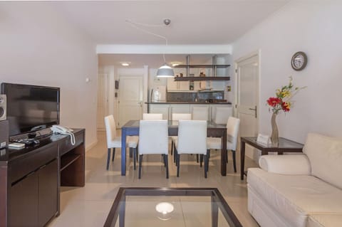 Family Apartment, Garden View | Living area | 40-inch TV with satellite channels