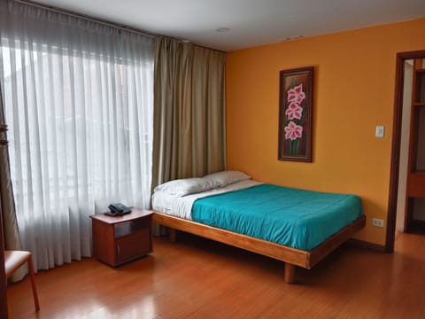 Family Double or Twin Room, 1 Bedroom | In-room safe, desk, laptop workspace, free WiFi