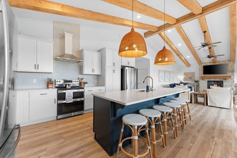 Pull up a barstool to keep the cook company!