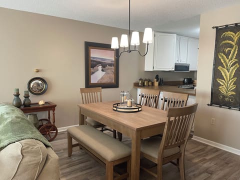 Dining room table and kitchen bar.