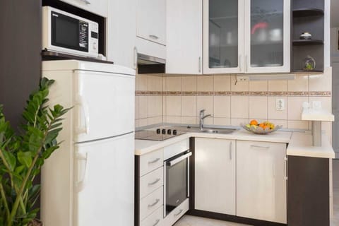 Apartment, Beach View | Private kitchen | Full-size fridge, microwave, oven, stovetop