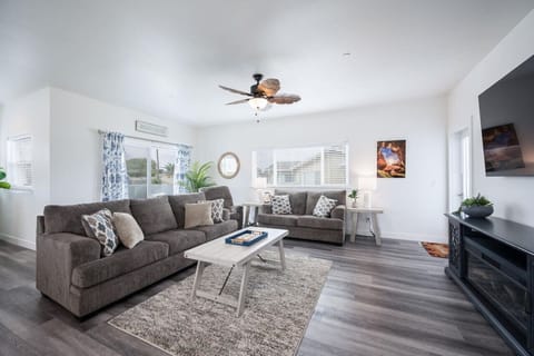 Living room with deck and rooftop access